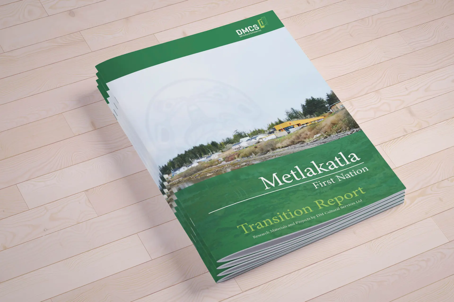 Stack of reports, cover design is a photo of Metlaktla with their crest superimposed in the sky behind the village